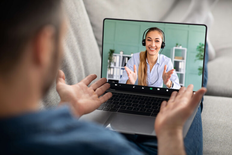 man reclining on couch using laptop have online 2023 11 28 04 08 48 utc 2