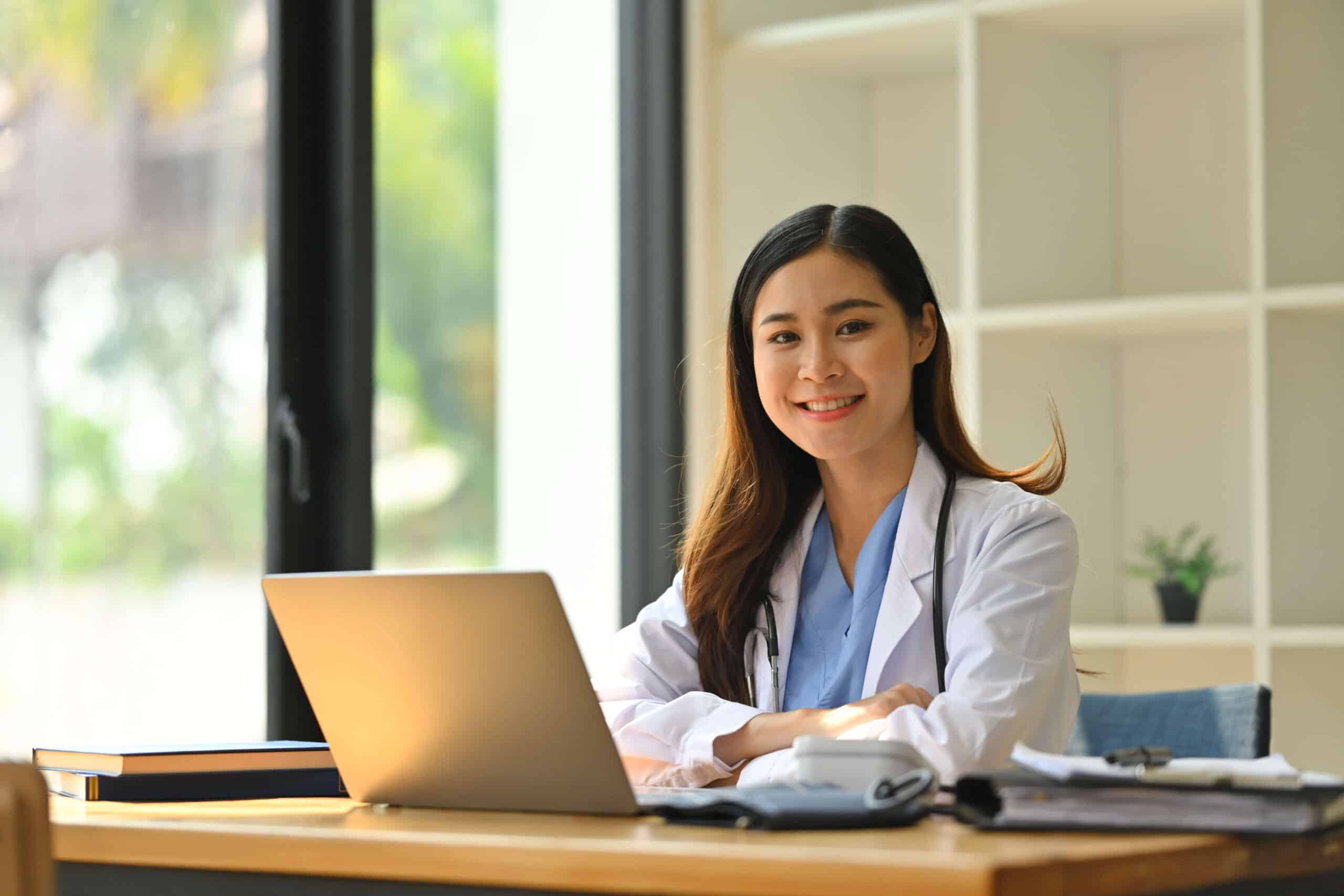 confident asian female doctor in white coat and st 2024 12 04 15 40 33 utc scaled